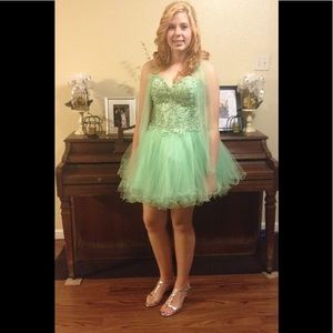 Beautiful Jovan above knee length prom dress